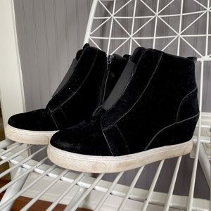 Black slip on sneakers